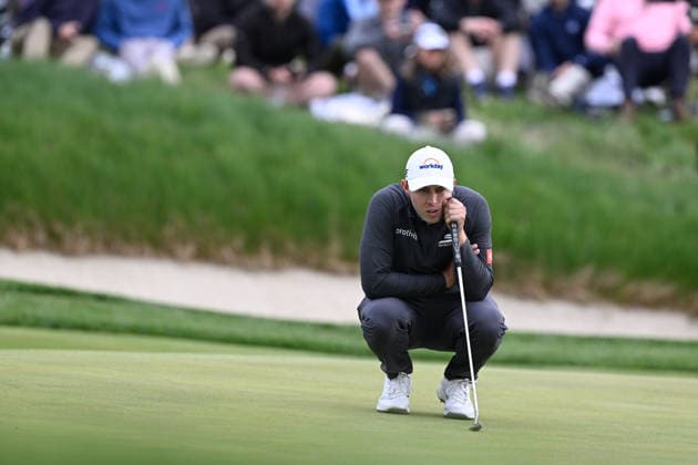 NEWTON SQUARE, PA - MAY 14: Matt Fitzpatrick of England lines up his shot on a steep slope during round one of the 2026 PGA, Golf Herren Championship on May 14th, 2026 at Aronimink Golf Club in Newtown Square, PA.(Photo by Terence Lewis Icon Sportswire) GOLF: MAY 14 PGA PGA Championship EDITORIAL USE ONLY Icon260514110