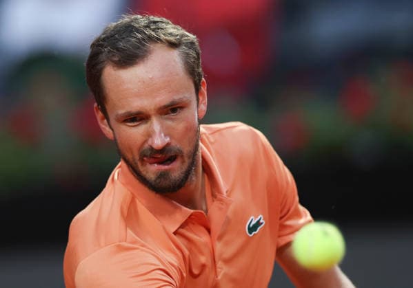 (260515) -- ROME, May 15, 2026 -- Daniil Medvedev of Russia hits a return during the men s singles quarterfinal match between Martin Landaluce of Spain and Daniil Medvedev of Russia at the ATP, Tennis Herren Italian Open in Rome, Italy, May 14, 2026. ) (SP)ITALY-ROME-TENNIS-ATP-MARTIN LANDALUCE VS DANIIL MEDVEDEV LixJing 