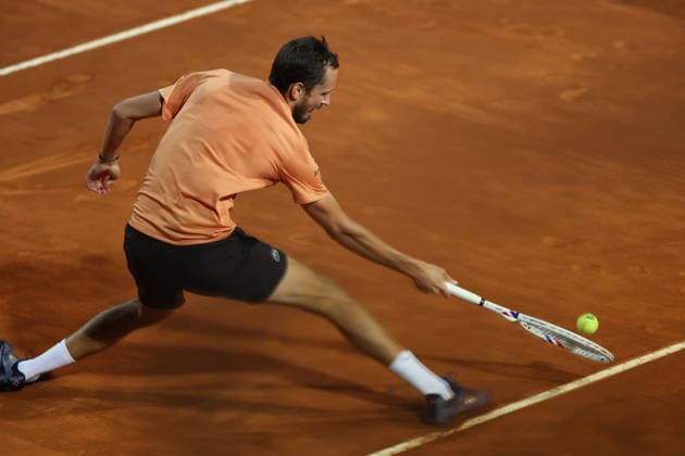 (260515) -- ROME, May 15, 2026 -- Daniil Medvedev of Russia hits a return during the men s singles quarterfinal match between Martin Landaluce of Spain and Daniil Medvedev of Russia at the ATP, Tennis Herren Italian Open in Rome, Italy, May 14, 2026. ) (SP)ITALY-ROME-TENNIS-ATP-MARTIN LANDALUCE VS DANIIL MEDVEDEV LixJing 