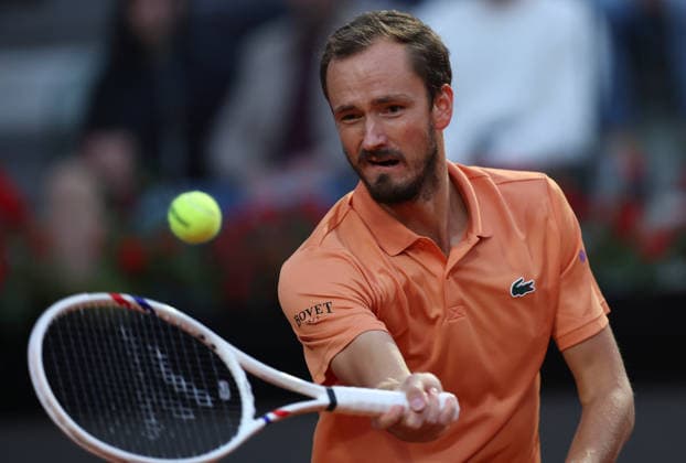 (260515) -- ROME, May 15, 2026 -- Daniil Medvedev of Russia hits a return during the men s singles quarterfinal match between Martin Landaluce of Spain and Daniil Medvedev of Russia at the ATP, Tennis Herren Italian Open in Rome, Italy, May 14, 2026. ) (SP)ITALY-ROME-TENNIS-ATP-MARTIN LANDALUCE VS DANIIL MEDVEDEV LixJing 
