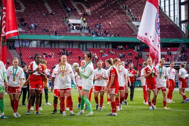 14 05 2026, xovx, Football, Women DFB Cup Final, VfL Wolfsburg FC Bayern Munich The players of FC Bayern Munich celebrate the double by winning the German Championship and the DFB Cup after the 4 0 victory over VfL Wolfsburg In front Ina Mahmutovic FC Bayern Munich with the cup Cologne Rhein Energie Stadium North Rhine-Westphalia Germany EN