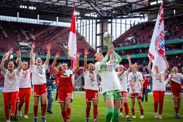 14 05 2026, xovx, Football, Women DFB Cup Final, VfL Wolfsburg FC Bayern Munich The players of FC Bayern Munich celebrate the double by winning the German Championship and the DFB Cup after the 4 0 victory over VfL Wolfsburg In front Ina Mahmutovic FC Bayern Munich with the cup Cologne Rhein Energie Stadium North Rhine-Westphalia Germany EN