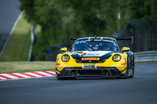 The Porsche 911 GT3 R 992 Evo26 with starting number 54 from Team Dinamic GT with drivers Bastian Buß, Michael Klitgaard Christensen, Joel Sturm and Loek Hartog drives during the top qualifying session on the Nordschleife of the Nürburgring Nürburg Rhineland-Palatinate Germany