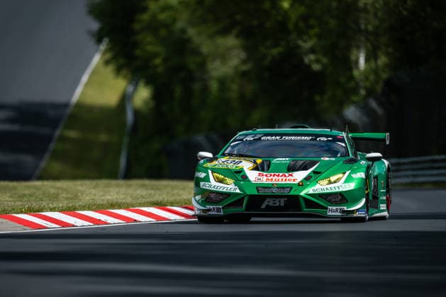 The Lamborghini Huracan GT3 EVO2 with starting number 130 from Team Red Bull Team ABT with drivers Marco Mapelli, Nicky Catsburg and Nicholas Yelloly drives during the top qualifying session on the Nordschleife of the Nürburgring Nürburg Rhineland-Palatinate Germany