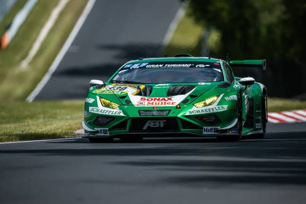 The Lamborghini Huracan GT3 EVO2 with starting number 130 from Team Red Bull Team ABT with drivers Marco Mapelli, Nicky Catsburg and Nicholas Yelloly drives during the top qualifying session on the Nordschleife of the Nürburgring Nürburg Rhineland-Palatinate Germany