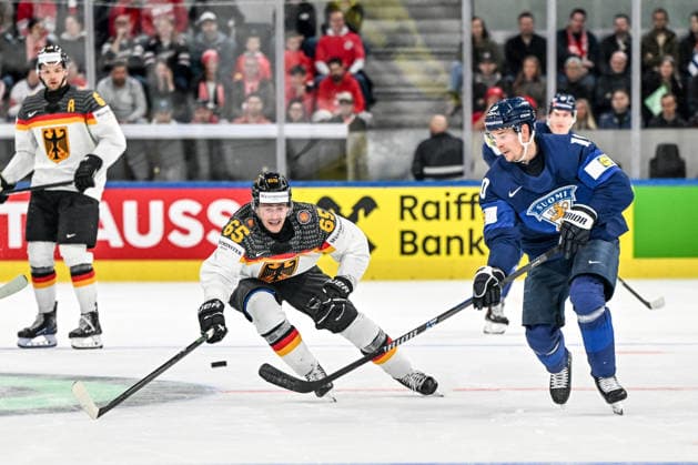 ZURICH, SWITZERLAND MAY 15 Henri Jokiharju of Finland plays the puck chased by Marc Michaelis of Germany during the 2026 IIHF Ice Hockey World Championship Switzerland game between Finland and Germany at Swiss Life Arena on May 15, 2026 in Zurich, Zurich Zurich Swiss Life Arena Zurich Switzerland Copyright: xJustPictures.ch AndreaxBrancax jp-en-EuSpIm-JP7_ANB_Fin_Ger_15052026_8753