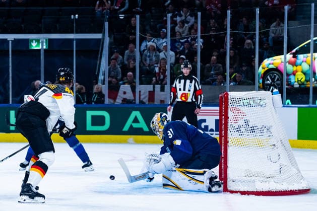 ZURICH, SWITZERLAND - MAY 15: Joshua Samanski (Germany, 44) trying to get the puck in front of the goal from Justus Annunen (Finland, 31) during the Preliminary Round - Group A Match 1 between Finland and Germany at the IIHF Ice hockey, Eishockey World Championship, WM, Weltmeisterschaft 2026, Swiss Life Arena on May 15, 2026 in Zurich, Switzerland. Zurich Switzerland Copyright: xTimoxSteinx