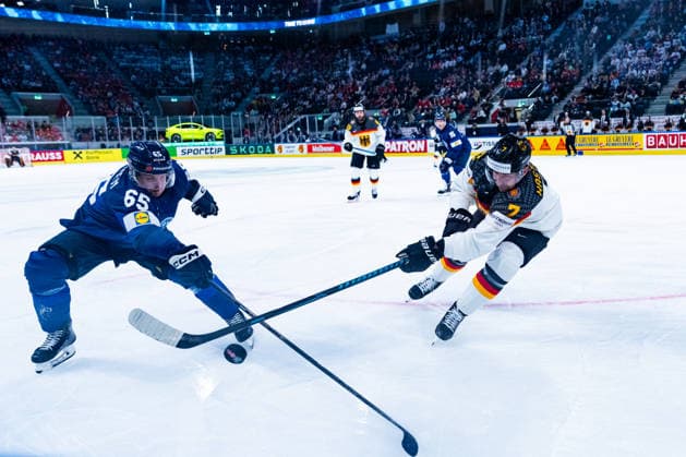 ZURICH, SWITZERLAND - MAY 15: Sakari Manninen (Finland, 65) in a duel against Maximilian Kastner (Germany, 7) during the Preliminary Round - Group A Match 1 between Finland and Germany at the IIHF Ice hockey, Eishockey World Championship, WM, Weltmeisterschaft 2026, Swiss Life Arena on May 15, 2026 in Zurich, Switzerland. Zurich Switzerland Copyright: xTimoxSteinx