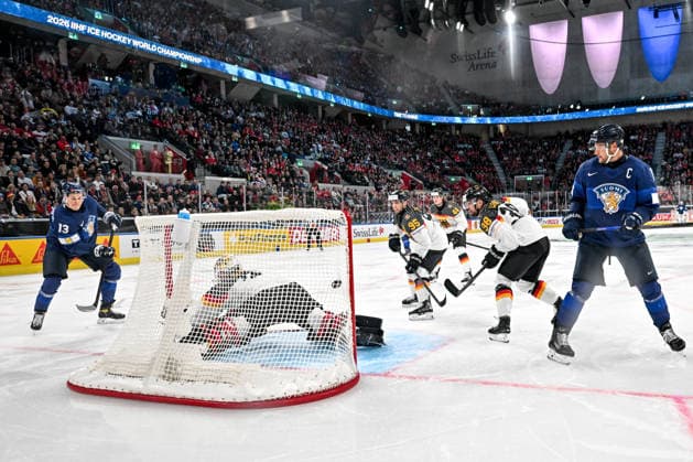 ZURICH, SWITZERLAND MAY 15 Jesse Puljujarvi of Finland L scores a goal against goalkeeper Philipp Grubauer of Germany during the 2026 IIHF Ice Hockey World Championship Switzerland game between Finland and Germany at Swiss Life Arena on May 15, 2026 in Zurich, Zurich Zurich Swiss Life Arena Zurich Switzerland Switzerland Copyright: xJustPictures.ch AndreaxBrancax jp-en-EuSpIm-JP7_ANB_Fin_Ger_15052026_1903