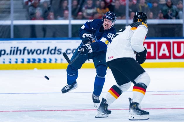 ZURICH, SWITZERLAND - MAY 15: Urho Vaakanainen (Finland, 58) in the battle for the puck with Eric Mik (Germany, 12) during the Preliminary Round - Group A Match 1 between Finland and Germany at the IIHF Ice hockey, Eishockey World Championship, WM, Weltmeisterschaft 2026, Swiss Life Arena on May 15, 2026 in Zurich, Switzerland. Zurich Switzerland Copyright: xTimoxSteinx
