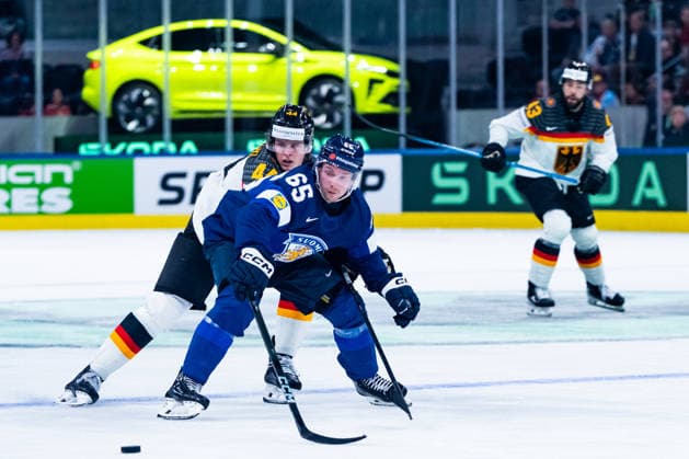 ZURICH, SWITZERLAND - MAY 15: Sakari Manninen (Finland, 65) in the battle for the puck with Joshua Samanski (Germany, 44) during the Preliminary Round - Group A Match 1 between Finland and Germany at the IIHF Ice hockey, Eishockey World Championship, WM, Weltmeisterschaft 2026, Swiss Life Arena on May 15, 2026 in Zurich, Switzerland. Zurich Switzerland Copyright: xTimoxSteinx