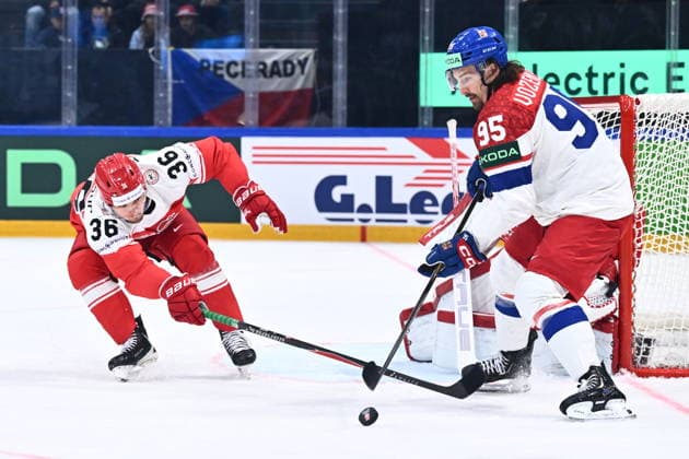 From left Daniel Baastrup of Denmark and Daniel Vozenilek of Czech Republic in action during the IIHF World Championship, WM, Weltmeisterschaft Group B match Czech Republic vs Denmark on May 15, 2026, Fribourg, Switzerland. (CTKxPhoto RadekxPetrasek) CTKPhotoP2026051508132  CTKPhotoP2026051508132