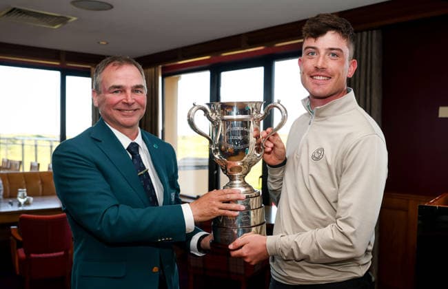 REPRO FREE *PRESS RELEASE NO REPRODUCTION FEE* EDITORIAL USE ONLY North of Ireland Men s Amateur Open, Royal Portrush Golf Club, Portrush 15 5 2026 Dylan Keating is presented with the North of Ireland Men™s Amateur Open Cup by John Doran, Chairperson of the Golf Ireland Ulster Region Dylan Keating is presented with the North of Ireland Men™s Amateur Open Cup by John Doran 15 5 2026  Copyright: x INPHO NickxElliottx AC010553