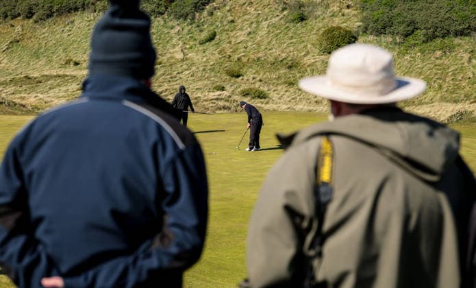REPRO FREE *PRESS RELEASE NO REPRODUCTION FEE* EDITORIAL USE ONLY North of Ireland Men s Amateur Open, Royal Portrush Golf Club, Portrush 15 5 2026 Spectators watch on as Patrick Curran putts Spectators watch on as Patrick Curran putts 15 5 2026  Copyright: x INPHO NickxElliottx AC019452