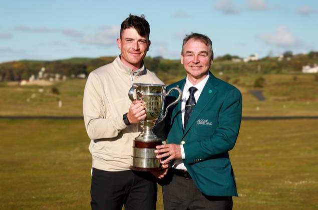 REPRO FREE *PRESS RELEASE NO REPRODUCTION FEE* EDITORIAL USE ONLY North of Ireland Men s Amateur Open, Royal Portrush Golf Club, Portrush 15 5 2026 Dylan Keating is presented with the North of Ireland Men™s Amateur Open Cup by John Doran, Chairperson of the Golf Ireland Ulster Region Dylan Keating is presented with the North of Ireland Men™s Amateur Open Cup by John Doran 15 5 2026  Copyright: x INPHO NickxElliottx ne-2-7
