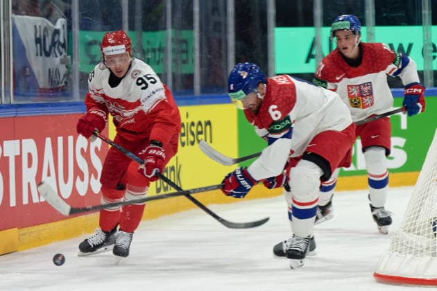 Fribourg, Switzerland - May 15 : Olesen Nick of Denmark Kempny Michal of Czechia battle for the puck (duel) during the 2026 IIHF Ice hockey, Eishockey World Championship, WM, Weltmeisterschaft match between Czechia and Denmark at Fribourg BCF Arena on May 15 , 2026 in Fribourg, Switzerland. Copyright: xGiuseppexVelletrix Sportspressphoto_SPR147168