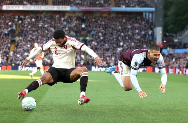 Joe Gomez of Liverpool fouls Emi Buendia of Aston Villa Aston Villa v Liverpool, Premier League, Football, Villa Park, Birmingham, UK - 15 May 2026Birmingham Villa Park United Kingdom EDITORIAL USE ONLY No use with unauthorised audio, video, data, fixture lists, club league logos or live services. Online in-match use limited to 120 images, no video emulation. No use in betting, games or single club league player publications. Copyright: xKieranxMcManus Shutterstockx 16876814u
