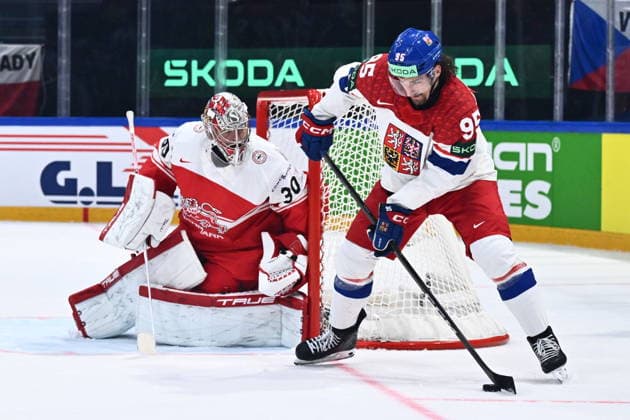 From left goalkeeper Mads Sogard of Denmark and Daniel Vozenilek of Czech Republic in action during the IIHF World Championship, WM, Weltmeisterschaft Group B match Czech Republic vs Denmark on May 15, 2026, Fribourg, Switzerland. (CTKxPhoto RadekxPetrasek) CTKPhotoP2026051508408  CTKPhotoP2026051508408