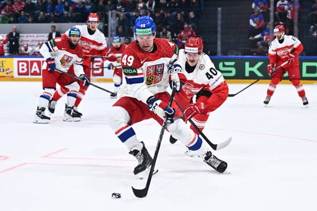 Jaroslav Chmelar of Czech Republic, left, and Anders Koch of Denmark in action during the IIHF World Championship, WM, Weltmeisterschaft Group B match Czech Republic vs Denmark on May 15, 2026, Fribourg, Switzerland. (CTKxPhoto RadekxPetrasek) CTKPhotoP2026051508420  CTKPhotoP2026051508420