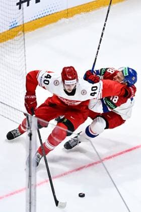 From left Anders Koch of Denmark and Dominik Kubalik of Czech Republic in action during the IIHF World Championship, WM, Weltmeisterschaft Group B match Czech Republic vs Denmark on May 15, 2026, Fribourg, Switzerland. (CTKxPhoto RadekxPetrasek) CTKPhotoP2026051508642  CTKPhotoP2026051508642