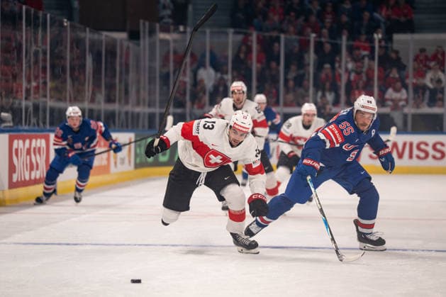 ZURICH, ZURICH - MAY 15: Nico Hischier of Switzerland battles with Ryan Lindgren of USA during the 2026 IIHF World Championship, WM, Weltmeisterschaft Group A match between Switzerland and USA at Swiss Life Arena on May 15, 2026 in Zurich, Zurich, Switzerland. Copyright: xLivioxBaeriswylx xSPPx Sportspressphoto_SPR147234