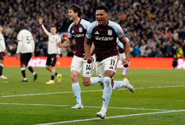 Birmingham, England, 15th May 2026. Ollie Watkins of Aston Villa celebrates after scoring the third goal during the Aston Villa vs Liverpool Premier League match at Villa Park, Birmingham. Picture credit should read: Andrew Yates Sportimage EDITORIAL USE ONLY. No use with unauthorised audio, video, data, fixture lists, club league logos or live services. Online in-match use limited to 120 images, no video emulation. No use in betting, games or single club league player publications. SPI_030_AY_ASTON_VILLA_LIVERPOOL SPI-4802-0029
