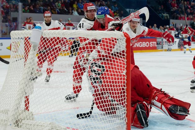 Fribourg, Switzerland - May 15 : Vozenilek Daniel of Czechia Jensen Aabo Jesper of Denmark Sogaard Mads of Denmark battle for the puck (duel) during the 2026 IIHF Ice hockey, Eishockey World Championship, WM, Weltmeisterschaft match between Czechia and Denmark at Fribourg BCF Arena on May 15 , 2026 in Fribourg, Switzerland. Copyright: xGiuseppexVelletrix Sportspressphoto_SPR147270