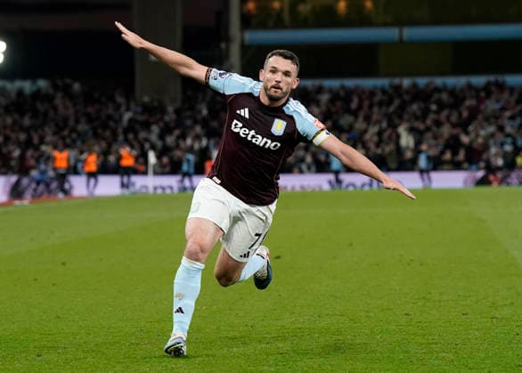 Birmingham, England, 15th May 2026. John McGinn of Aston Villa celebrates after scoring the fourth goal during the Aston Villa vs Liverpool Premier League match at Villa Park, Birmingham. Picture credit should read: Andrew Yates Sportimage EDITORIAL USE ONLY. No use with unauthorised audio, video, data, fixture lists, club league logos or live services. Online in-match use limited to 120 images, no video emulation. No use in betting, games or single club league player publications. SPI_042_AY_ASTON_VILLA_LIVERPOOL SPI-4802-0041