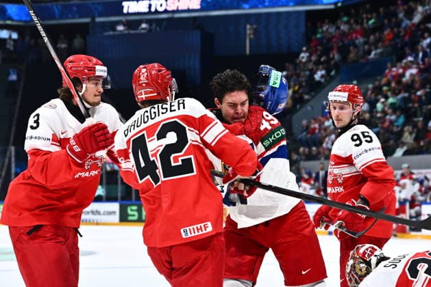 From left Phillip Bruggisser of Denmark and Jaroslav Chmelar of Czech Republic in action during the IIHF World Championship, WM, Weltmeisterschaft Group B match Czech Republic vs Denmark on May 15, 2026, Fribourg, Switzerland. (CTKxPhoto RadekxPetrasek) CTKPhotoP2026051509094  CTKPhotoP2026051509094