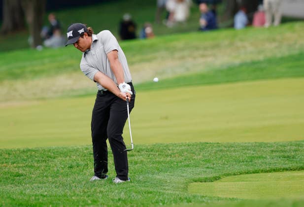 Aldrich Potgieter of South Africa chips out of the rough to the 18th green during the second round of the 2026 PGA, Golf Herren Championship at Aronimink Golf Club in Newtown Square, Pennsylvania, on Friday, May 15, 2026.  PHI20260515890 LAURENCExKESTERSON
