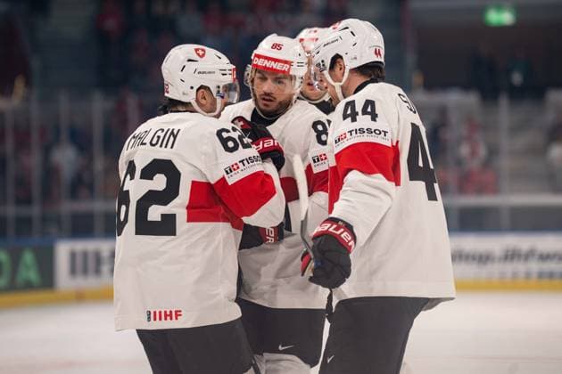 ZURICH, ZURICH - MAY 15: Denis Malgin, Sven Andrighetto and Pius Suter of Switzerland celebrate during the 2026 IIHF World Championship, WM, Weltmeisterschaft Group A match between Switzerland and USA at Swiss Life Arena on May 15, 2026 in Zurich, Zurich, Switzerland. Copyright: xLivioxBaeriswylx xSPPx Sportspressphoto_SPR147413