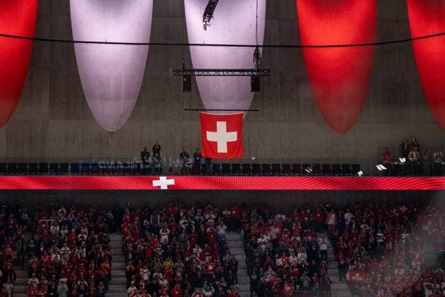 ZURICH, ZURICH - MAY 15: The Switzerland flag is raised inside the arena after the victory following the 2026 IIHF World Championship, WM, Weltmeisterschaft Group A match between Switzerland and USA at Swiss Life Arena on May 15, 2026 in Zurich, Zurich, Switzerland. Copyright: xLivioxBaeriswylx xSPPx Sportspressphoto_SPR147451