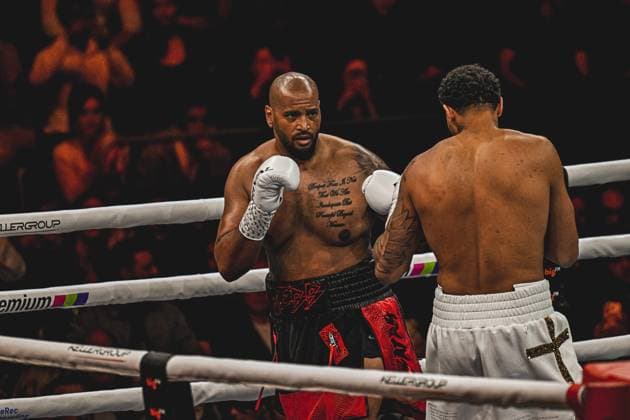 Emanuel Odiase and Nick Webb in an intense exchange of blows in the ring of the SAP Arena Ringside, 15 05 2026, Mannheim, SAP Arena Copyright: xspeedshotx