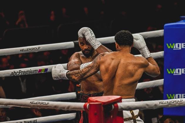 Emanuel Odiase and Nick Webb deliver an intense exchange of blows in the ring of the SAP Arena Mannheim at the ringside event Night of the Heavyweights on 15 05 2026 The fight shows both boxers in full action with cover and attack position Ringside, 15 05 2026, Mannheim, SAP Arena Copyright: xspeedshotx