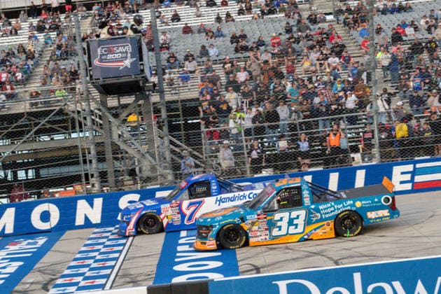DOVER, DE - MAY 15: Kyle Busch ( 7 Spire Motorsports HendrickCars.com Chevrolet) passes Frankie Muniz ( 33 Team Reaume Nico s Bagels & Brunch Ford) during the NASCAR, Motorsport, USA CRAFTSMAN Truck Series ECOSAVE 200 on May 15, 2026, at Dover Motor Speedway in Dover, DE. (Photo by David Hahn Icon Sportswire) AUTO: MAY 15 NASCAR CRAFTSMAN Truck Series ECOSAVE 200 EDITORIAL USE ONLY Icon260515022