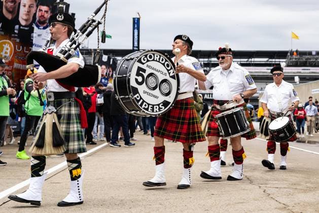 May 15, 2026, Speedway, Indiana, USA: The Gordon Pipers march their way through the garages during Fast Friday of the 110th Indianapolis 500 at Indianapolis Motor Speedway. IndyCar, Indy Car, IRL, USA 2026: Indy 500 Fast Friday Practice  - ZUMAw173 20260515_zsp_w173_059 Copyright: xLukexWelshx