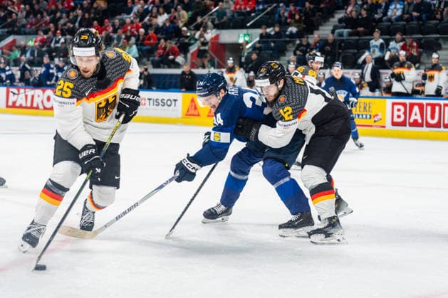 xxkeikkaxx 20260515 Swiss Life Arena, Zurich, Switzerland. IIHF Ice hockey, Eishockey World Championships match Finland vs Germany Leon Hüttl (25) of Team Germany Aatu Räty (34) of Team Finland Eric Mik (12) of Team Germany Photo by Pasi Suokko All Over Press  1.06181893