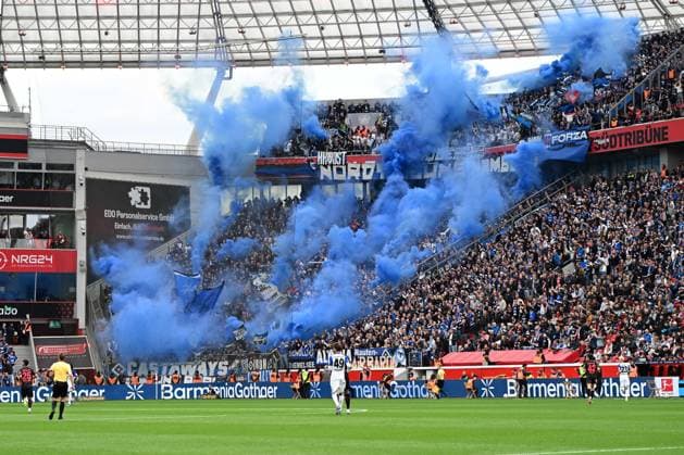 Fans Hamburger SV fans using pyrotechnics during the Bundesliga match between Bayer 04 Leverkusen and Hamburger SV, BayArena on May 16, 2026 in Leverkusen, Germany Photo by Ralf Treese DeFodi Images Fans Hamburger SV supporters use pyrotechnics during the Bundesliga match between Bayer 04 Leverkusen and Hamburger SV at BayArena on May 16, 2026 in Leverkusen, Germany Photo by Ralf Treese DeFodi Images DFL regulations prohibit any use of photographs as image sequences and or quasi video Photo by Ralf Treese DeFodi Images
