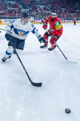 ZURICH, SWITZERLAND - MAY 16: Sakari Manninen (Finland, 65) in a duel against Bence Stipsicz (Hungary, 12) during the Preliminary Round - Group A Match 7 between Hungary and Finland at the IIHF Ice hockey, Eishockey World Championship, WM, Weltmeisterschaft 2026, Swiss Life Arena on May 16, 2026 in Zurich, Switzerland. Zurich Switzerland Copyright: xTimoxSteinx