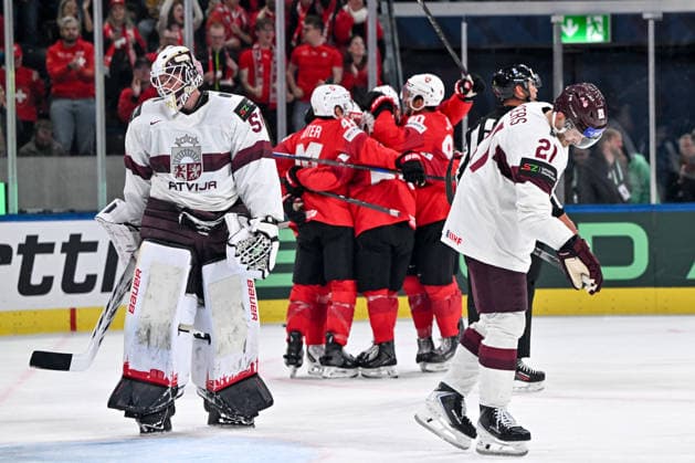 ZURICH, SWITZERLAND MAY 16 Rudolfs Balcers of Latvia R and goalkeeper Kristers Gudlevskis of Latvia L disappointed after giving up a goal during the 2026 IIHF Ice Hockey World Championship Switzerland game between Switzerland and Latvia at Swiss Life Arena on May 16, 2026 in Zurich, Zurich Zurich Swiss Life Arena Zurich Switzerland Copyright: xJustPictures.ch AndreaxBrancax jp-en-EuSpIm-JP7_ANB_Sui_Lat_16052026_5621