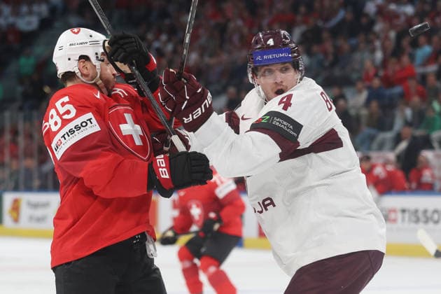Ice Hockey World Championship 2026 SUI LAT Sven Andrighetto vs Kristofers Bindulis 16 05 2026 Swiss Life Arena Zuerich , SWITZERLAND, Men IIHF Ice Hockey World Championship Zurich 2026 Group Switzerland Latvia Sven Andrighetto li,Switzerland vs Kristofers Bindulis Latvia