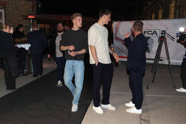 Anton Kade 30 FC Augsburg , Cedric Zesiger 16 FC Augsbburg , Press spokesman Dominik Schmitz FC Augsburg , FC Augsburg end of season party, Football, 1 Bundesliga, 34 Matchday, 16 05 2026 DFL DFB regulations prohibit any use of photographs as image sequences and or quasi video Augsburg Bayern Germany Copyright: xkolbert-press ChristianxKolbertx