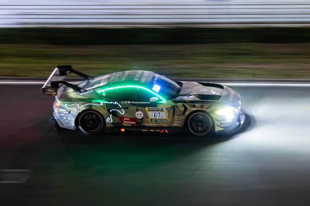The Ford Mustang GT3 EVO 2026 with starting number 67 from the HRT Ford Racing team with drivers Frank Dennis Olsen, Christopher Mies, Frederic Vervisch and Frank Stippler drives at night on the Nürburgring Grand Prix circuit in Rhineland-Palatinate Germany during the 24-hour race.