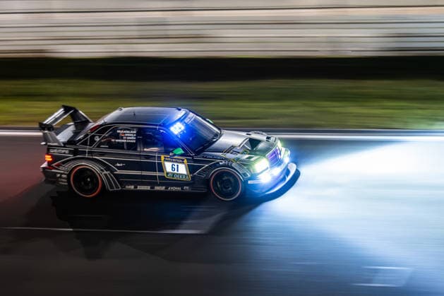 The HWA EVO R with starting number 61 from the HWA Engineering Speed team with drivers Adam Adelson, Lance David Arnold, James Green and Renger Van der Zande will drive at night on the Nürburgring Grand Prix circuit in Nürburg, Rhineland-Palatinate, Germany during the 24-hour race