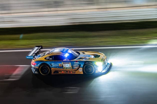 The Mercedes AMG GT3 with starting number 26 from the PROsport racing team with drivers Adam Christodoulou, Christopher Lulham, Mikael Grenier and Marek Böckmann will drive at night on the Nürburgring Grand Prix circuit in Nürburg Rhineland-Palatinate Germany during the 24-hour race