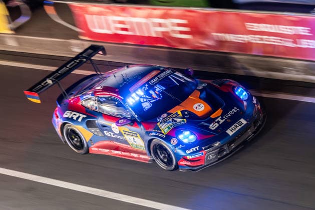 The Porsche 911 GT3 R 992 Evo26 with starting number 4 from Team Goroyan RT by Car Collection with drivers Artur Goroyan, Oleg Kivtka, Nathanael Berthon and Alex Fontana will be driving at night in the pit lane on the Nürburgring Grand Prix circuit Nürburg Rheinland Pfalz Germany during the 24h race.