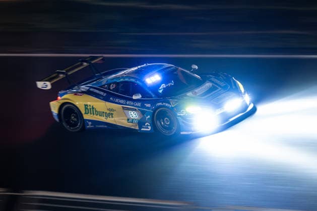 The McLaren 720S GT3 with starting number 69 from the Doerr Motorsport team with drivers Timo Glock, Timo Scheider, Ben Doerr and Marvin Kirchhöfer drives at night during the 24-hour race on the Nürburgring Grand Prix circuit in Nürburg Rhineland-Palatinate Germany