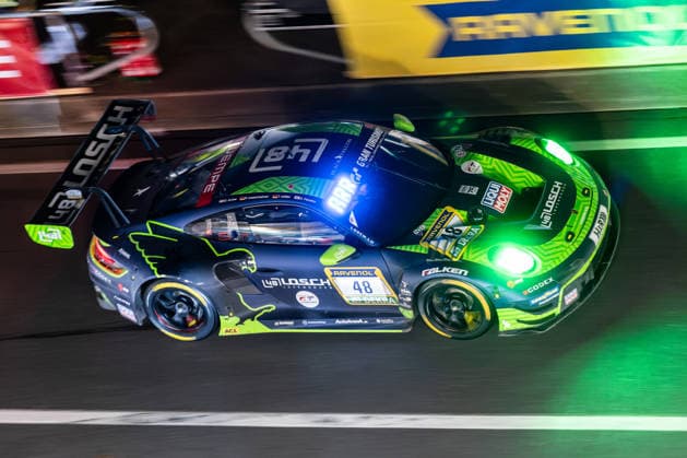 The Porsche 911 GT3 R 992 Evo26 with starting number 48 from Team 48 LOSCH Motorsport by BLACK FALCON with drivers Daan Arrow, Patrick Assenheimer, Tobias Müller and Dylan Pereira will be driving at night in the pit lane on the Nürburgring Grand Prix circuit in Nürburg Rhineland-Palatinate Germany during the 24-hour race.