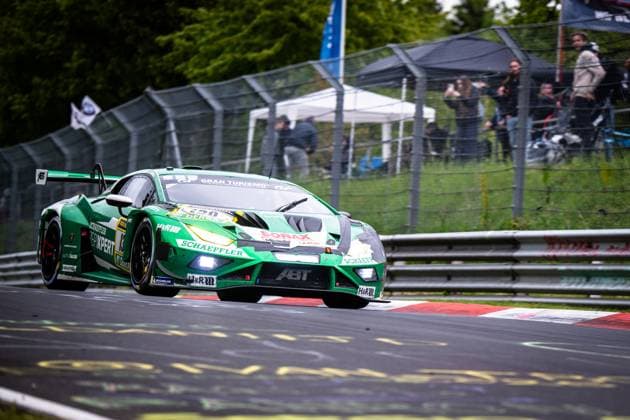 The green Lamborghini Huracán GT3 from White Angel for Fly and Help with starting number 13 drives through a corner on the Nordschleife of the Nürburgring The vehicle bears the sponsors Schäffler, Repixpert, Sonax and H R and is adorned with the ABT logo Spectators and barriers can be seen in the background, emphasizing the race track atmosphere at the 24h Nürburgring 2026 13 Reiter Engineering Lamborghini Huracán GT3 13 from White Angel for Fly and Help on the Nordschleife Copyright: xMichaelxGelhardtx