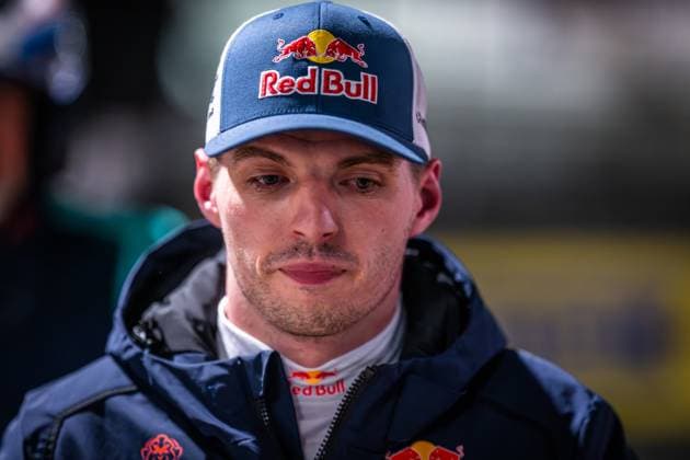 Close-up of a driver with Red Bull team clothing and Red Bull cap in the paddock The person is wearing dark racing clothing with Red Bull branding and is positioned facing the camera Max Verstappen in the paddock at the 24h Nürburgring Copyright: xMichaelxGelhardtx